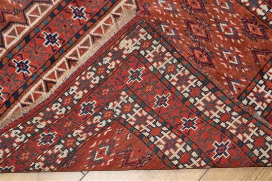 A Tekke style red ground rug 164 x 130cm